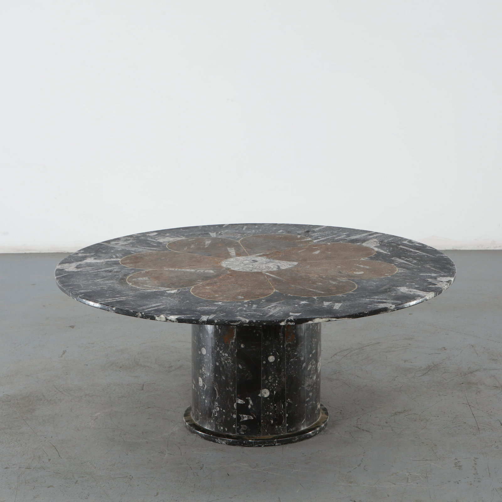 Monumental Marble Coffee Table in the style of Heinz Lilienthal, 1960s: This monumental fossil marble coffee table is an exceptional example of 1970s organic modernism. Its integration of prehistoric stone elements aligns beautifully with the work of German artist and
