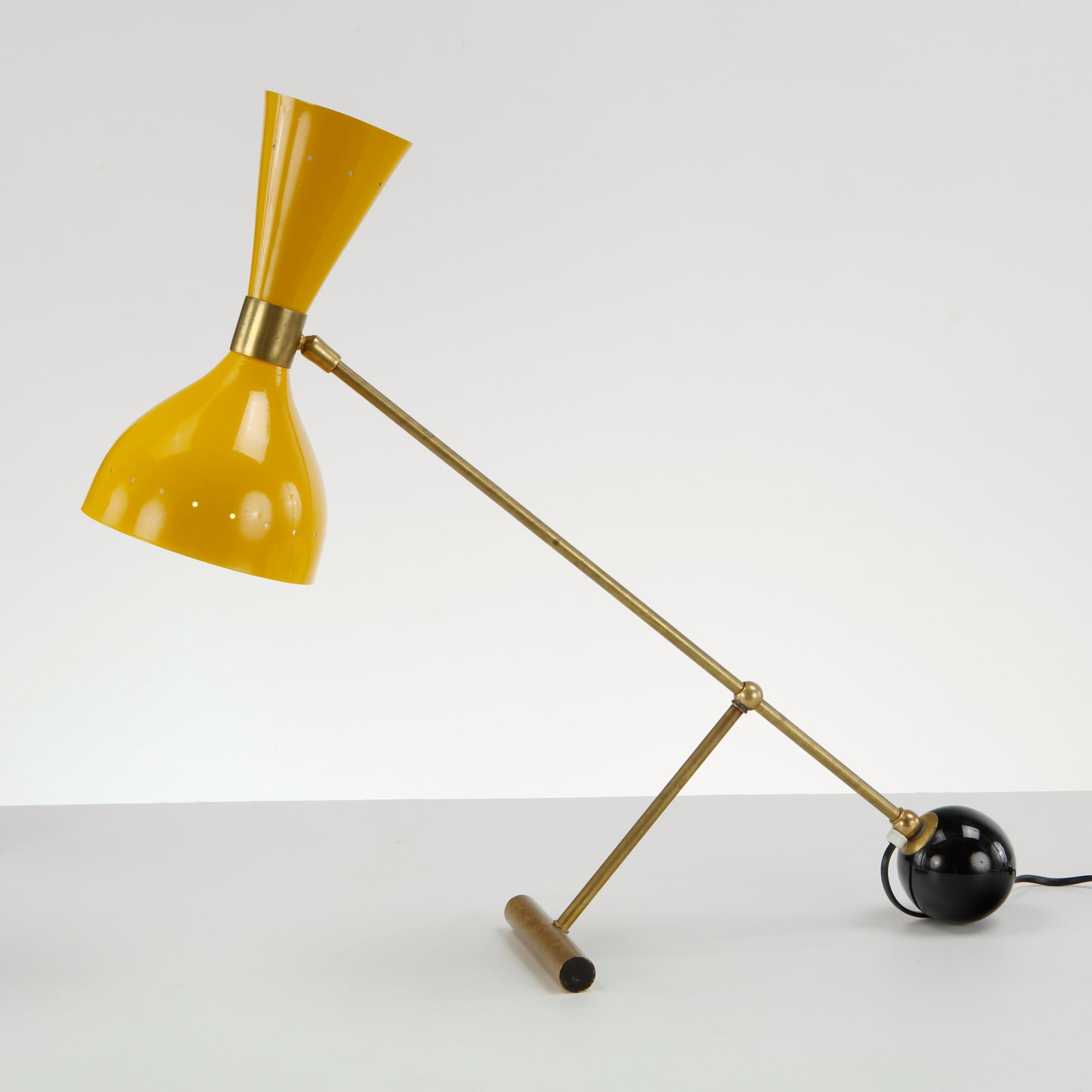 Stilnovo, Thunderball Yellow Table Lamp, 1960s: This mid-century modern desk or table lamp is a stunning, highly collectible piece of Italian lighting design by Stilnovo. Known for its graphic geometry and kinetic balance, this model expertly