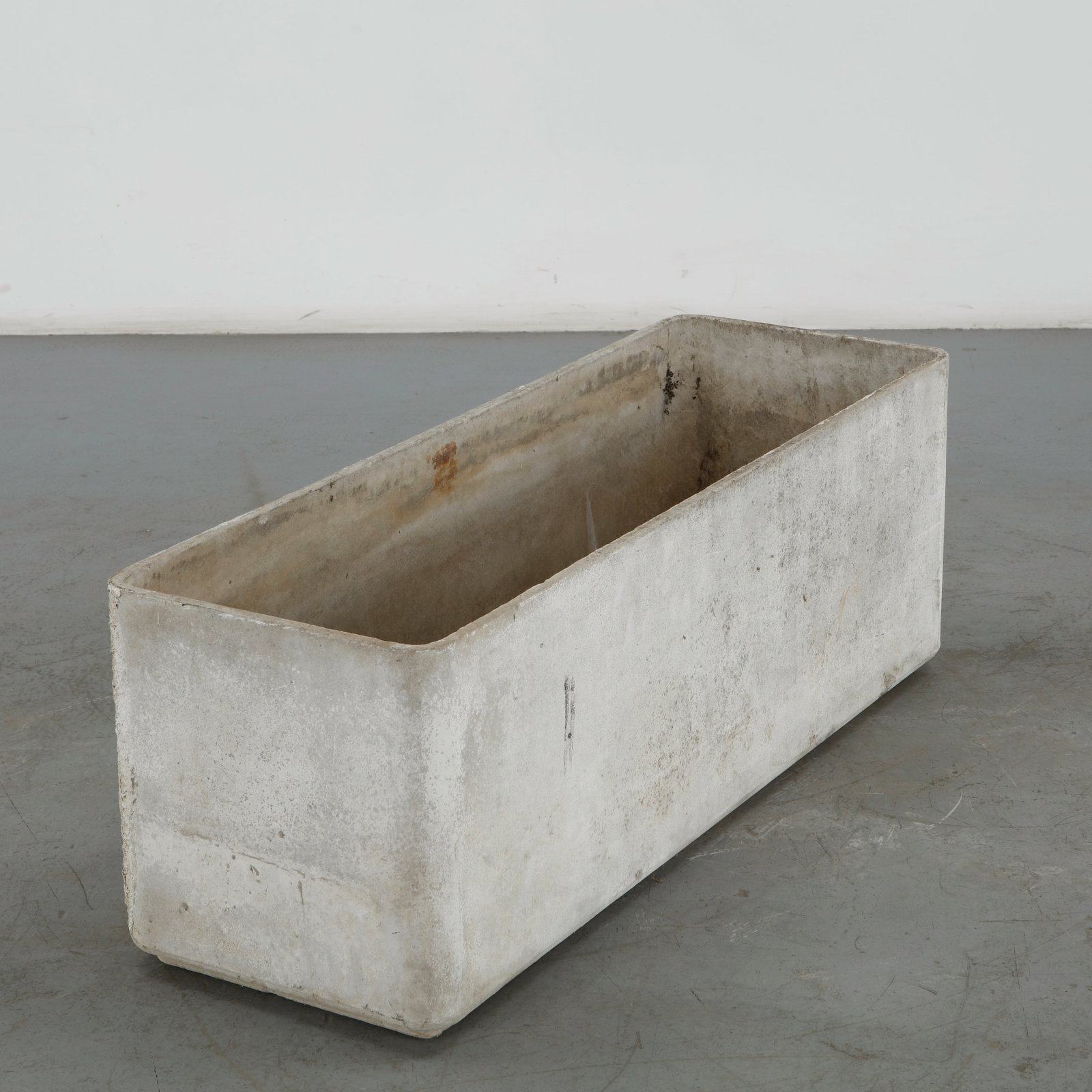 Willy Guhl, Large Rectangular Planter, 1960s: Classic rectangular Eternit planter designed by Willy Guhl. Timeless Swiss design with natural patina from outdoor use. Height: 17 in. Length: 47.25 in. Width: 16 in. Condition Wear comm