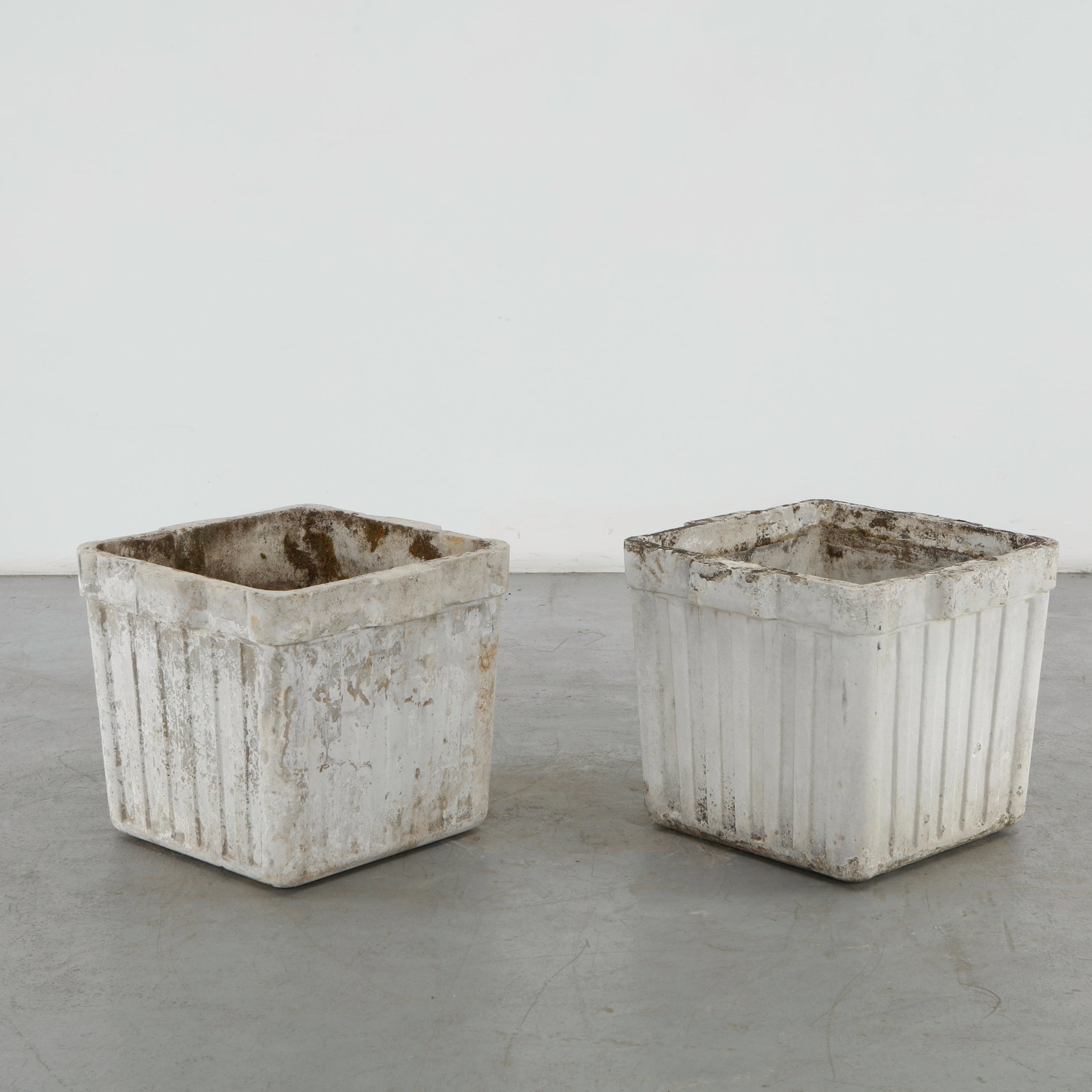 Willy Guhl, Pair of Large Square Planters, 1960s: This pair of square planters showcase Willy Guhl's mastery of geometric simplicity and the enduring quality of Swiss fiber cement craftsmanship. Their clean architectural forms are enriched by a