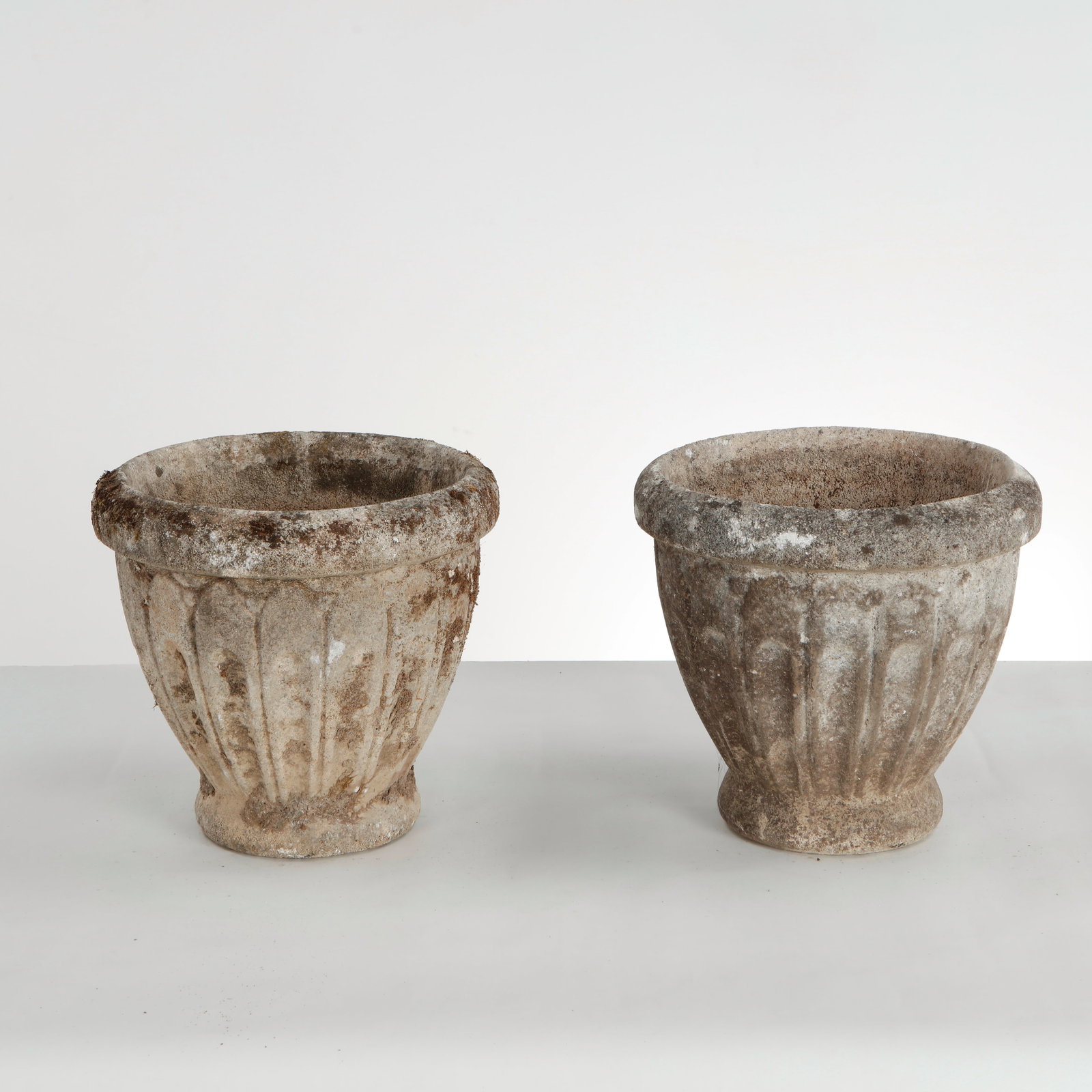 Grandon Fres, Pair of Stone Round Planters, 1960s: This pair of vintage cast stone campana urn planters produced by the renowned French manufacturer Grandon Freres in the 1960s is an excellent example of mid-century European classical revival garden d