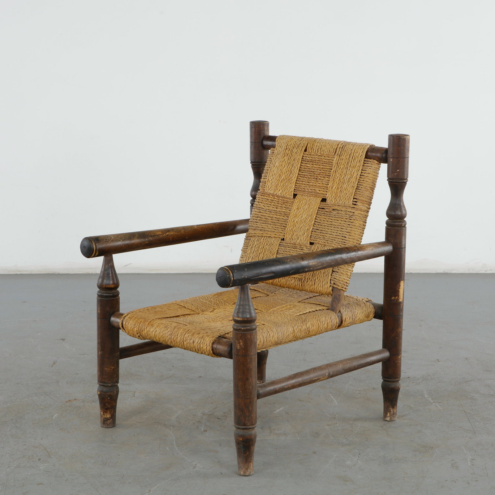 Adrien Audoux & Frida Minet, Lounge Armchair, 1950s: This vintage mid-century modern lounge armchair, designed by the famous French duo Adrien Audoux and Frida Minet circa 1950, is an iconic representation of French rustic modernism. Height: 32.5 in.