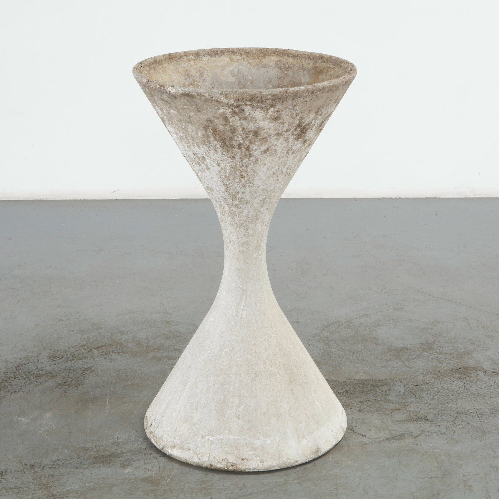 Willy Guhl, Large Diabolo Planter, 1960s: Willy Guhl Large diabolo planter manufactured by Eternit, Switzerland. Height: 38 in. Diameter: 21.5 in. Condition Wear commensurate with age and evidence of outdoor use. Outdoor pieces