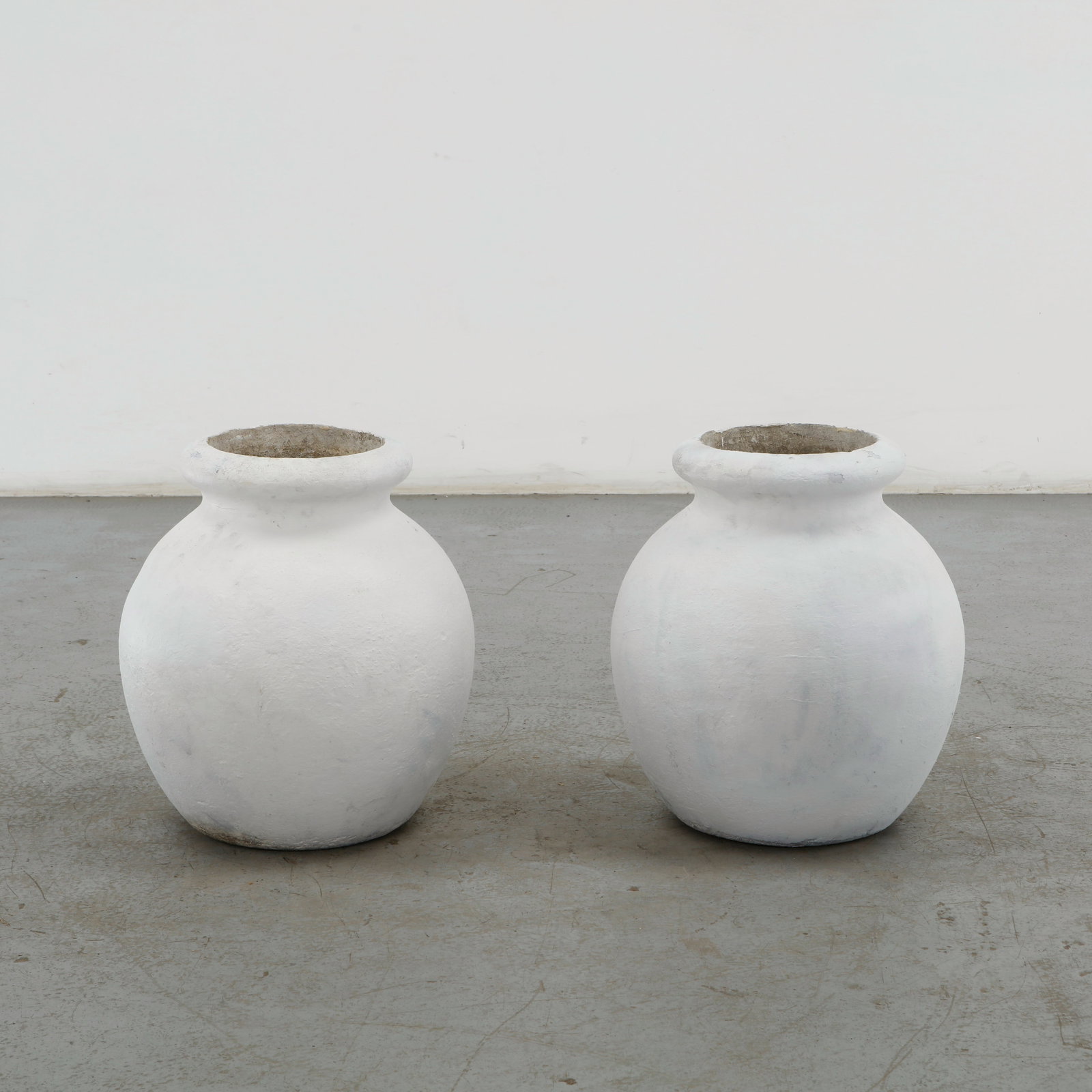 Willy Guhl, Pair of Jar Planters, 1960s: This pair of "Olive Jar" or "Honey Pot" garden planters by Willy Guhl is an exceptional duo of 1960s Swiss mid-century modern outdoor design, produced by the renowned manufacturer 