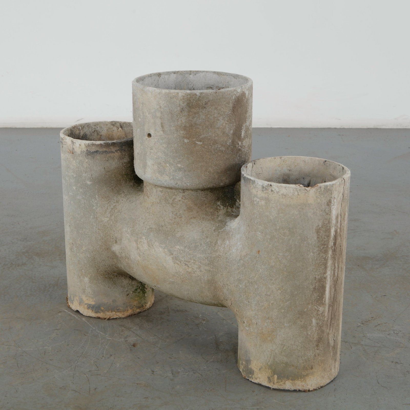 Willy Guhl, Triple Cylindrical Planter, Switzerland, 1960s: Often referred to by collectors as the "Pipe" or "T-Shaped" modular planter, this rare architectural vessel demonstrates Guhl's innovative ability to adapt industrial infrastru