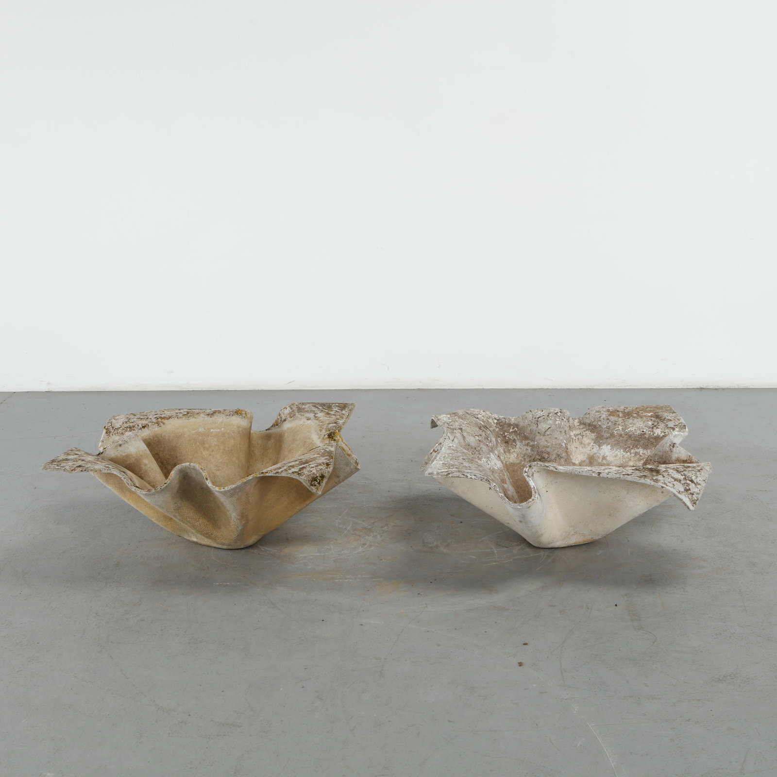 Willy Guhl, Pair of Large Elephant Ears Planters, 1960s: Pair of Large Elephant Ear planters, also known as handkerchief planters, by Willy Guhl for Eternit, Switzerland circa 1960. Width: 35 in. Length: 35 in. Height: 15 in. Condition Wear co