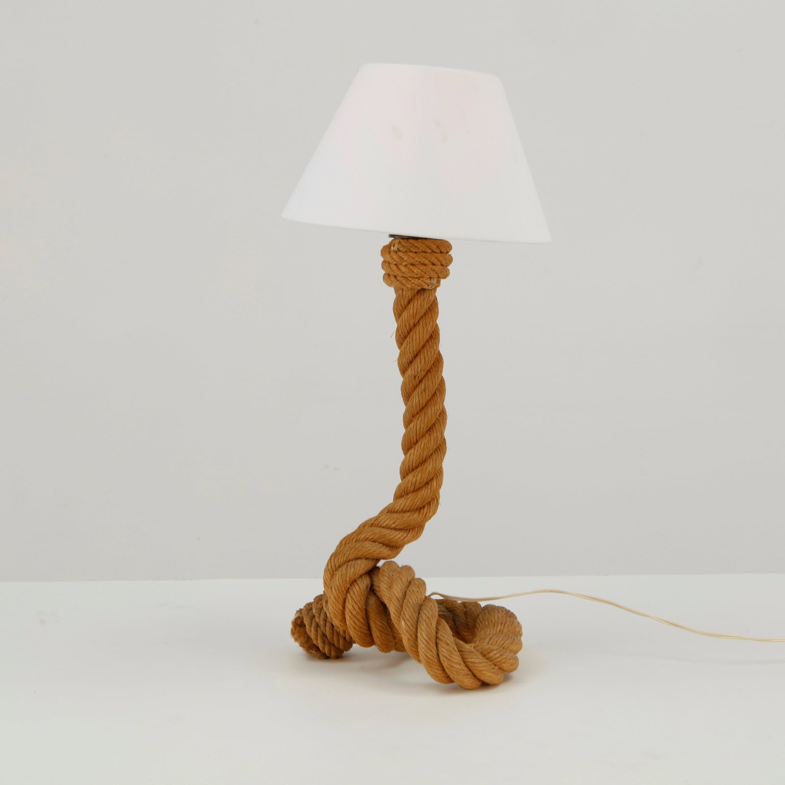 Louis Sognot, Rattan Sculptural Table Lamp, 1960s: This iconic piece is a mid-century modern nautical rope table lamp designed in the signature style of the French creative duo Adrien Audoux and Frida Minet, originally popularized during the 1950s and
