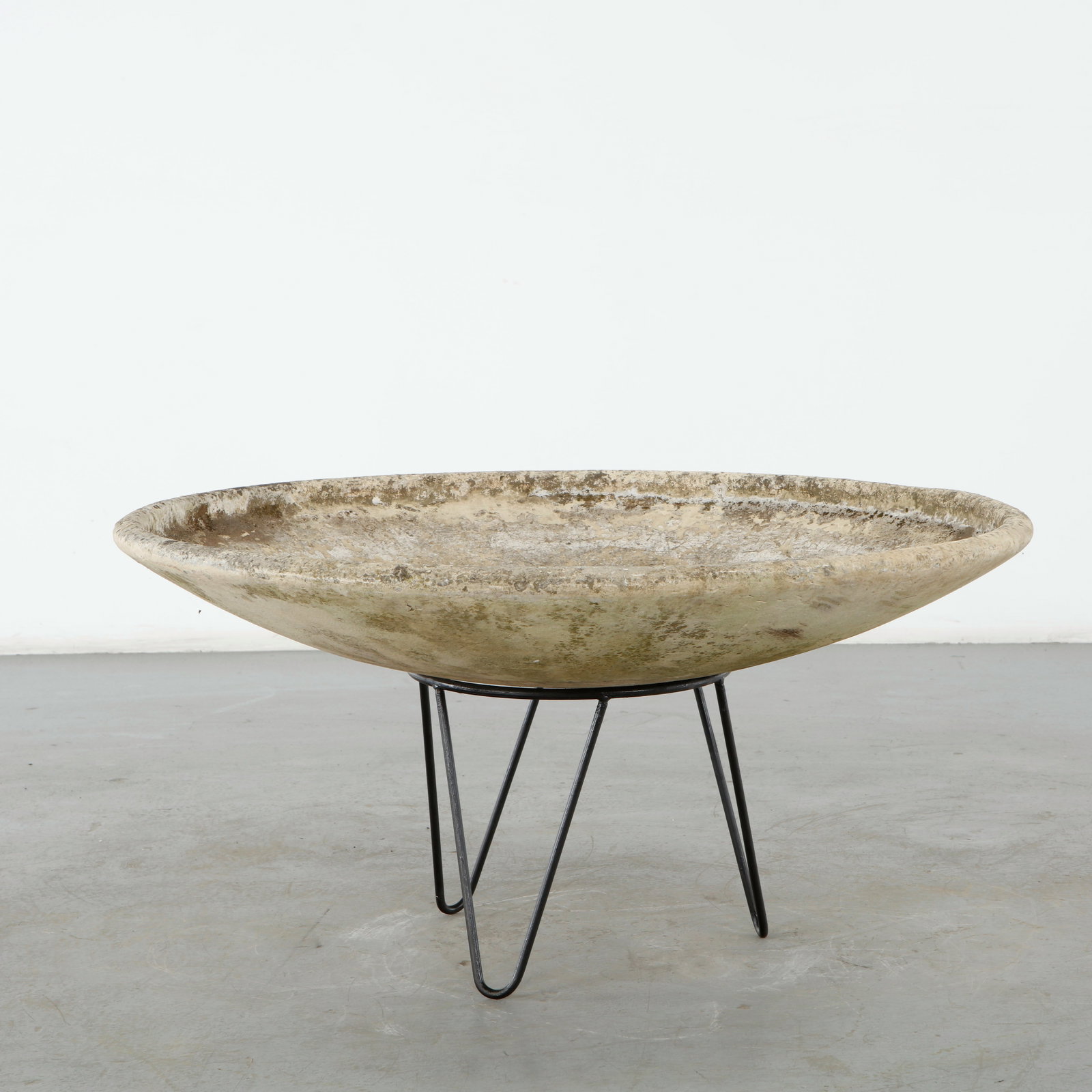 Willy Guhl, Large Bowl Planter on Stand, 1960s: Executed in Guhl signature fiber cement, this hemispherical planter reveals the sculptural purity of his modernist vocabulary. Its textured surface bears the poetry of time and use.Height: 20 in. Diam