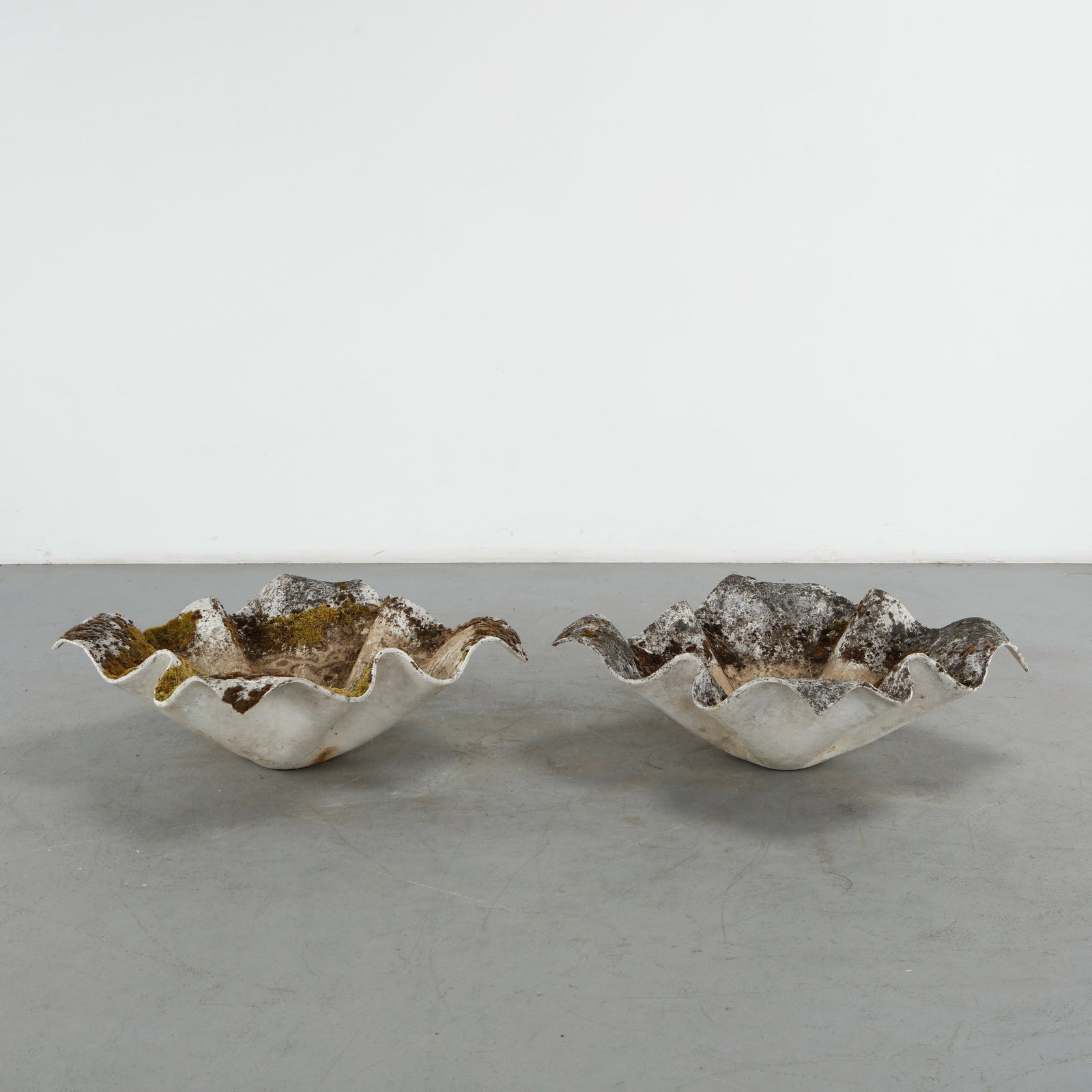 Willy Guhl, Large Elephant Ears Planter, 1960s: Pair of Large Elephant Ear planters, also known as handkerchief planters, by Willy Guhl for Eternit, Switzerland circa 1960. Width: 35 in. Length: 35 in. Height: 15 in. Condition Wear co