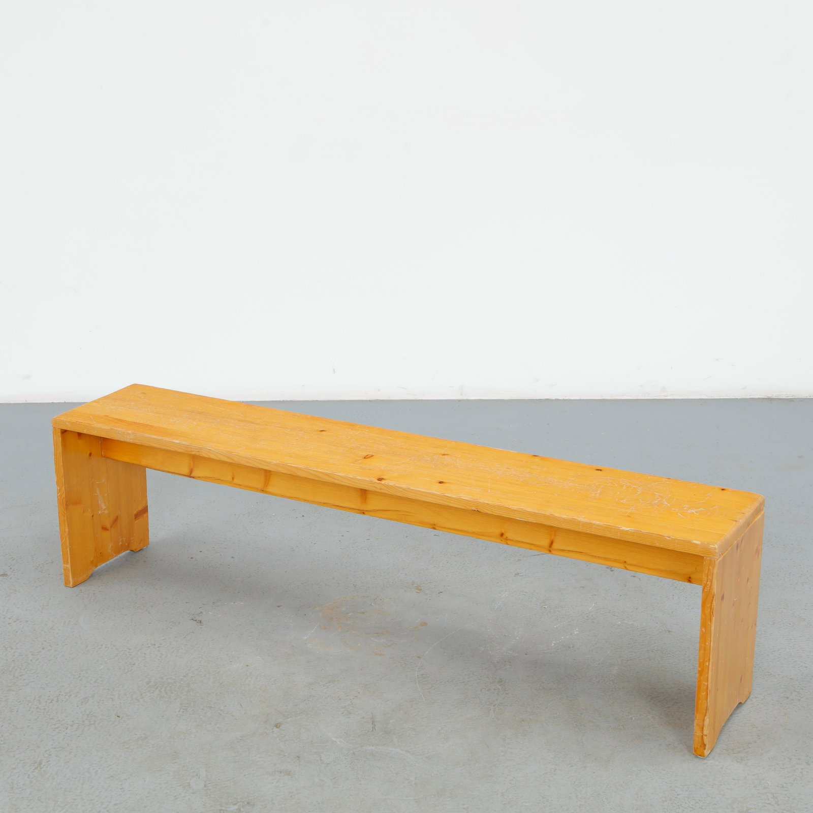 Charlotte Perriand for Les Arcs 1600, Pine Bench, 1960s: A rectangular bench in solid pine, the plank top raised on straight legs joined by a central stretcher. Pale grain and functional simplicity characteristic of Perriand's Les Arcs 1600