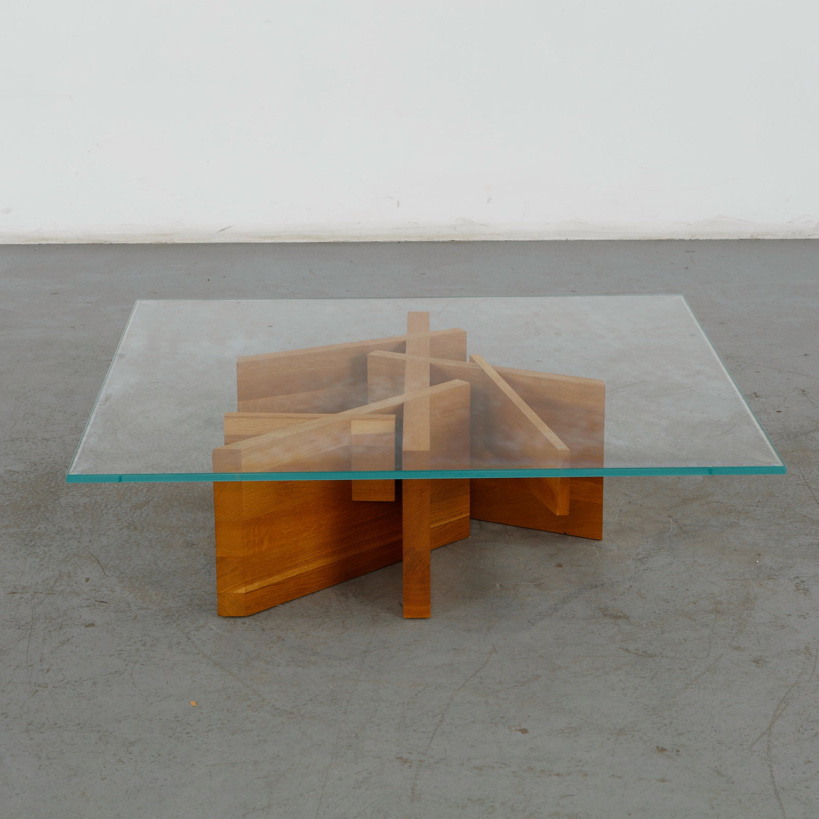 Noemie Rognon for Ligne Roset, Ashera Square Low Table: The Ashera Square Low Table, designed by French designer No_mie Rognon for the renowned luxury manufacturer Ligne Roset, is a masterful expression of modern eco-design. The piece is structured around