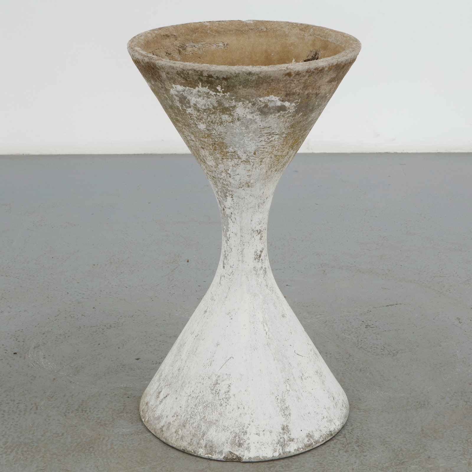 Willy Guhl, Medium Diabolo Planter, 1960s: Willy Guhl medium diabolo planter manufactured by Eternit, Switzerland. Height: 32 in. Diameter: 18 in. Condition Wear commensurate with age and evidence of outdoor use. Outdoor pieces