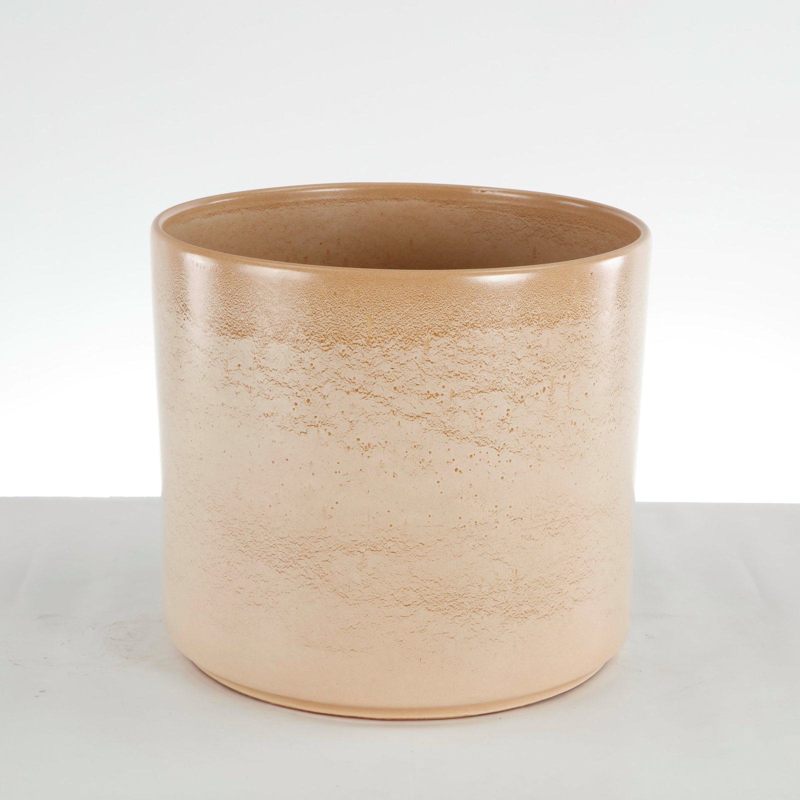 Round Ceramic Mid-Century Planter, 1960s: This vintage mid-century modern ceramic cylinder planter manufactured by the celebrated Gainey Ceramics of La Verne, California is an iconic example of California architectural pottery.ConditionGood v