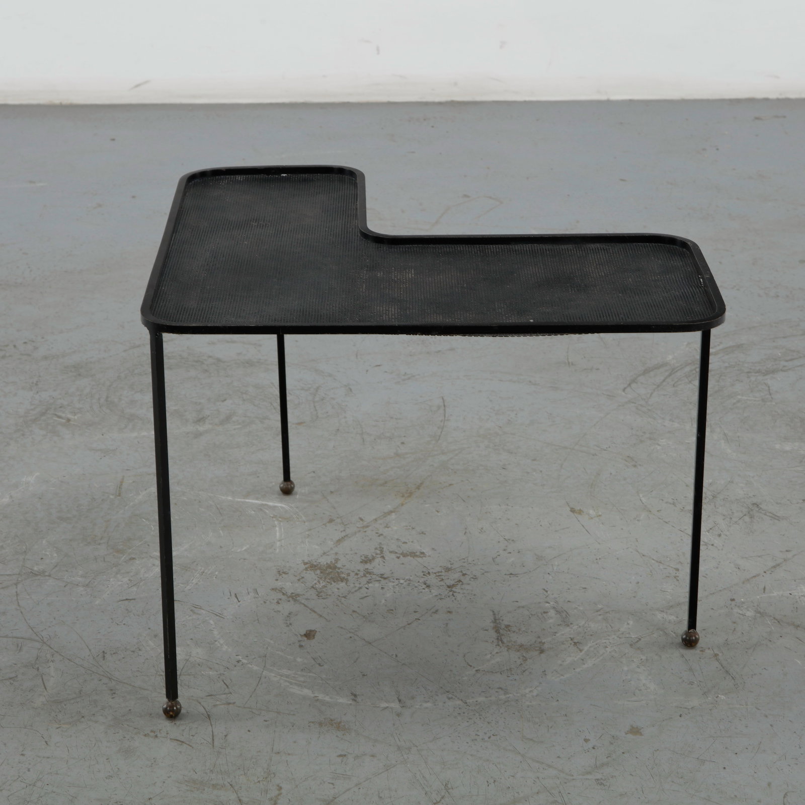 Matheiu Mategot, Domino Table, 1950s: An iconic mid-century modern piece designed in 1953 by the renowned French-Hungarian designer Mathieu Mategot. The surface is crafted entirely from Rigitulle, a proprietary, finely perforated sheet