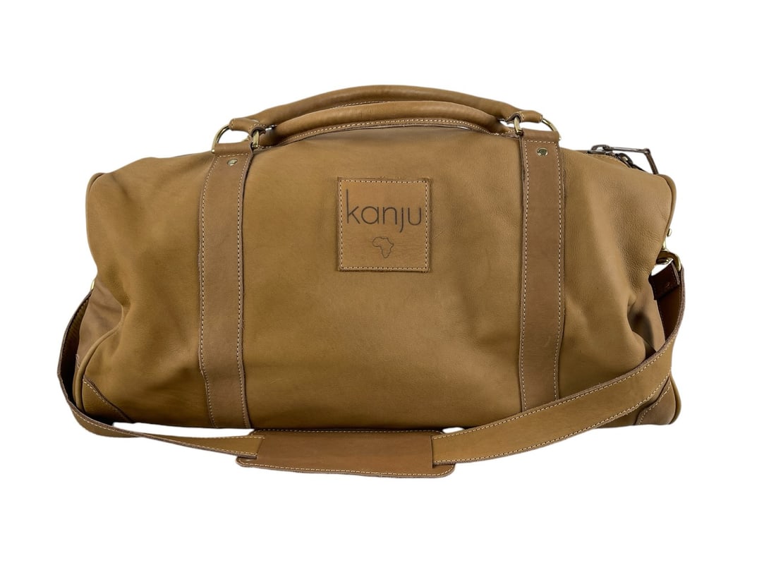 Kanju Leather Duffle Bag: 18W x 12D x 12H. Handcrafted, this hold-all can be used as a small onboard companion or weekender. Our leather is a hand-picked, tough and resistant full-grain which is beautiful, long-lasting and tan