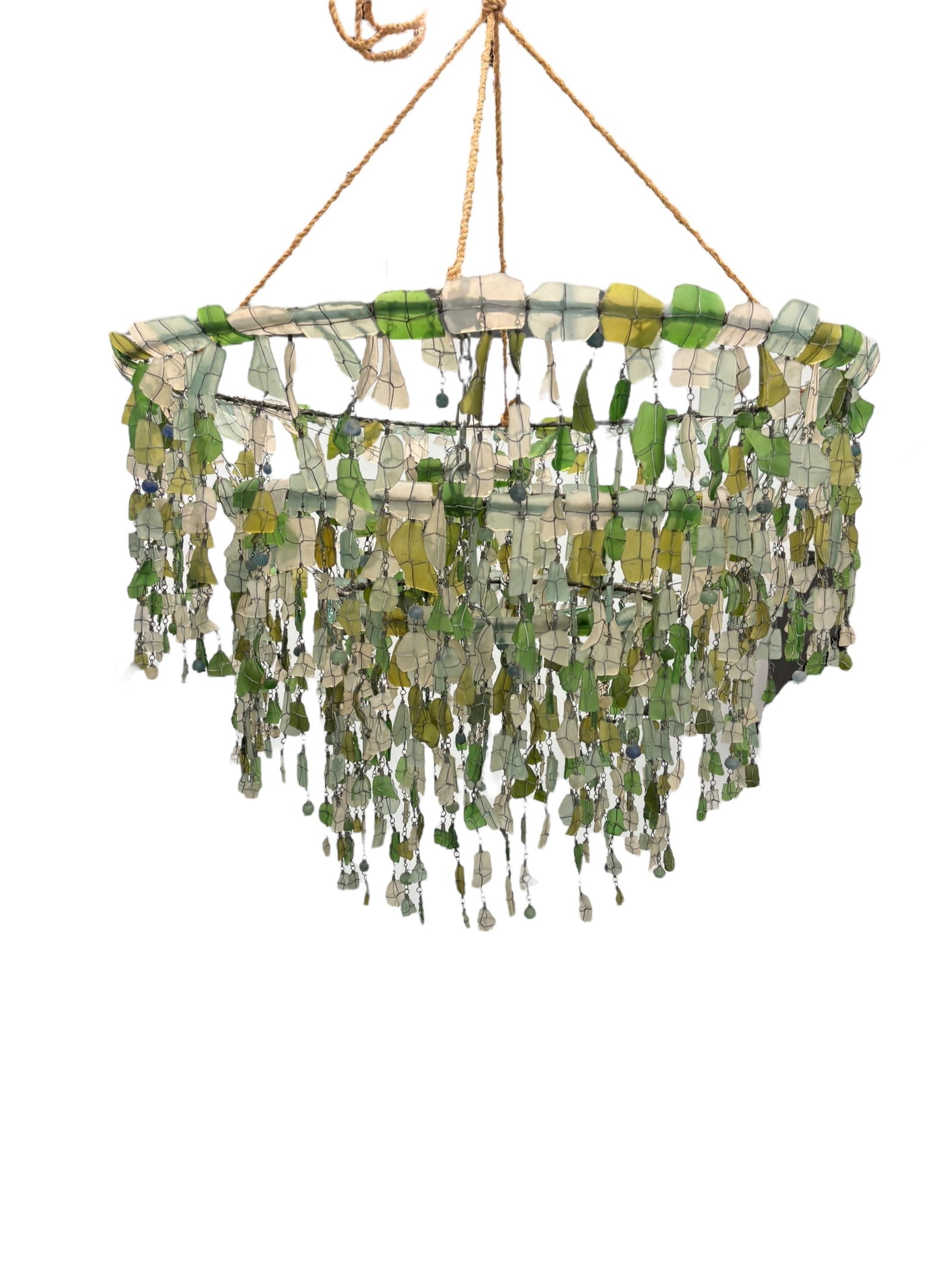 Tumbled Glass Chandelier Handmade: 24"L x 31" Diameter. Artisans turn glass in a homemade tumbler filled with local lakewater and sand for two days. All designs in the Tumbled Glass collection are availablein recycled glass that is col