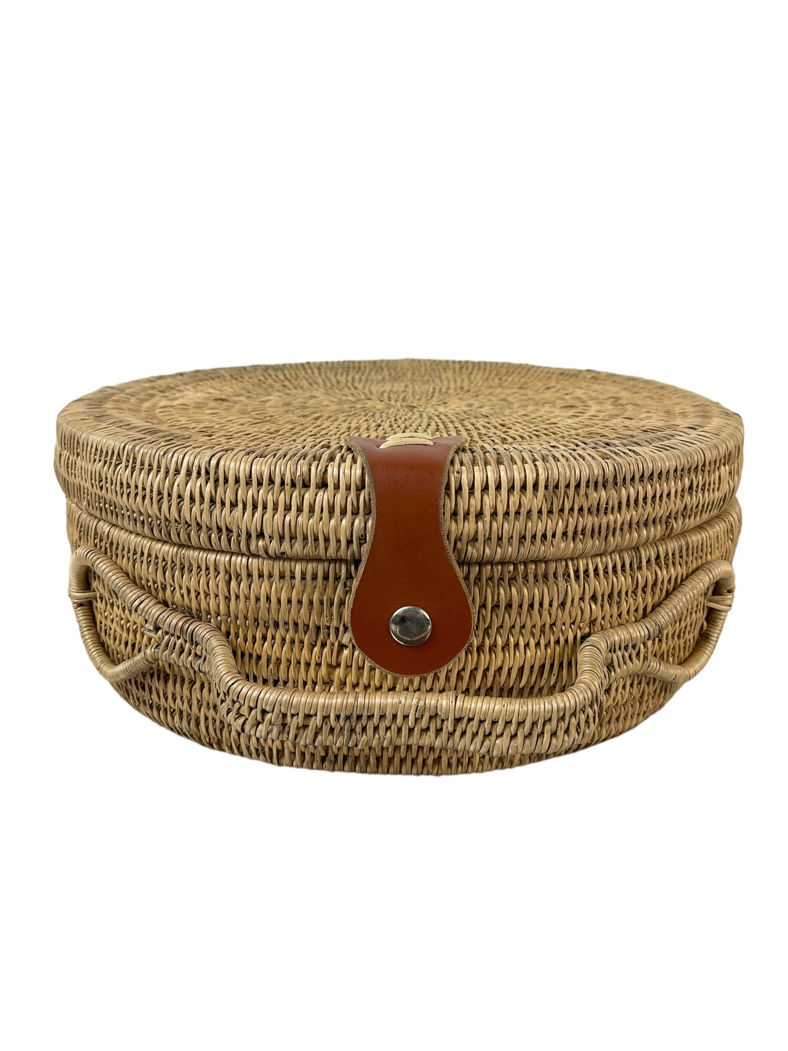 Handwoven Basket Hat Bag from Zambia: approx 13" diameter x 5"H. Leather and organic Wild grasses. Made from organic Makenge plant and wild grasses with naturally treated goat's leather, by skillful artisans in the west of Zambia. Carry s