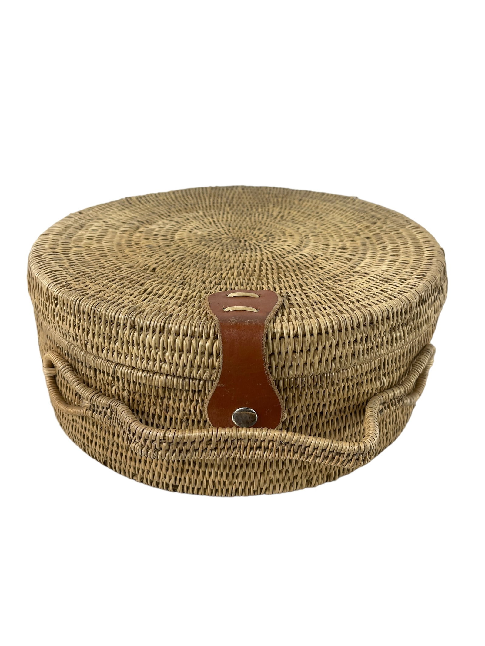 Handwoven Basket Hat Bag from Zambia: approx 13" diameter x 5"H. Leather and organic Wild grasses. Made from organic Makenge plant and wild grasses with naturally treated goat's leather, by skillful artisans in the west of Zambia. Carry s
