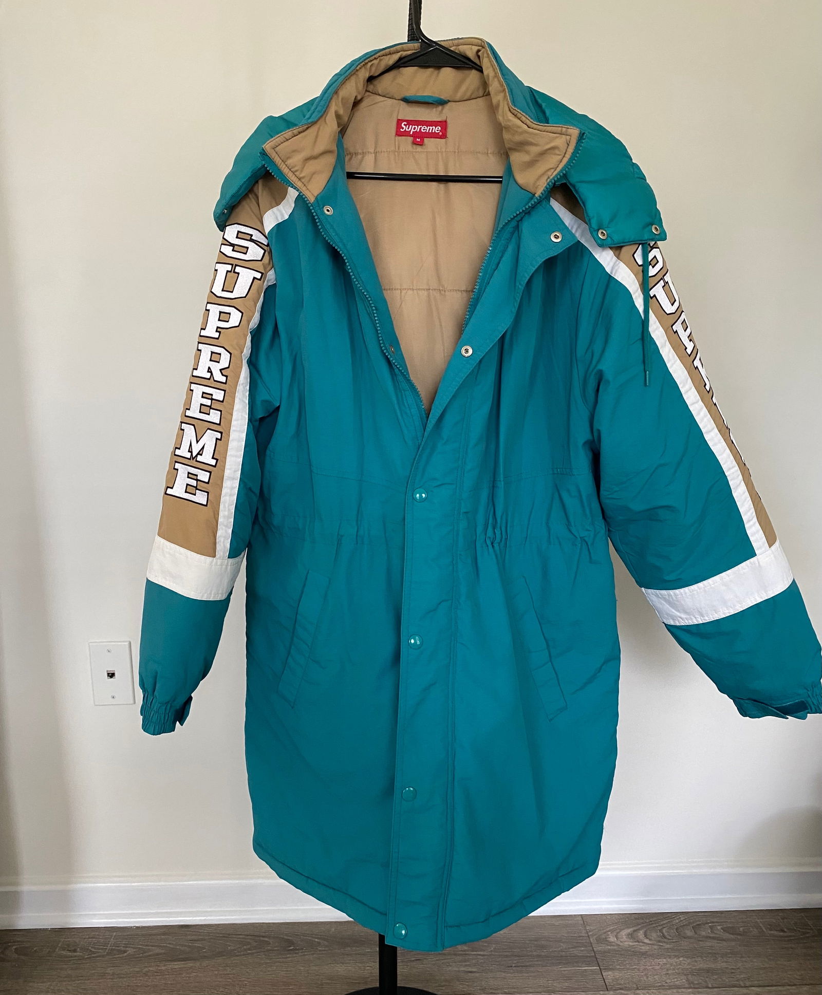 Supreme Long Coat: Product Description: Cotton. Brand: Supreme. Color: Green and Brown. Size: M