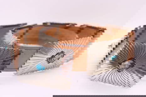 Vintage Circa 1960 Large Concho Belt: Navajo sterling silver concho belt With (7) square conchos 3 1/4" x 2 1/4", (1) belt buckle 3 1/4" x 2 1/4" on tan strap, 1 1/2", size 36. The handmade design is sunburst shadow box with 8 bezeled, ox