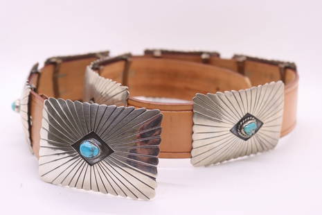 Vintage Circa 1960 Large Concho Belt: Navajo sterling silver concho belt With (7) square conchos 3 1/4" x 2 1/4", (1) belt buckle 3 1/4" x 2 1/4" on tan strap, 1 1/2", size 36. The handmade design is sunburst shadow box with 8 bezelled,