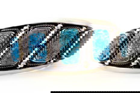 Navajo Silversmith Bobby Begay Turquoise Cuff: Navajo master silversmith Bobby Begay AAA lander blue turquoise sterling silver cuff with (5) stones center stone L 7/8" x 1/2 w tapering to L 3/4" x 3/8" w size 7. Gap 1 1/2". Bracelet width 1 1/2",