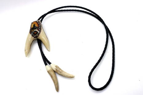 Vintage Comanche Deer Antler Bolo Tie Handmade: Vintage circa 1950 Comanche Deer Antler bolo tie. - Hand-made. This stunning two pronged slide piece of art has hand-painted Warrior on Horse. it measures L 3 1/8"x 13/4" W, (2) antler horn tips measu