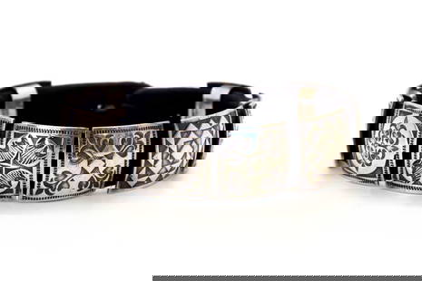Vintage Navajo Michael Montano SS Concho Bracelet: Vintage circa 1980 wward winning Navajo Michael Montano sterling silver concho bracelet with (8) hand-stamped and hand-tooled conchos measuring L 3/4"x3/4"W and (1) handmade, stamped button 1/2" round
