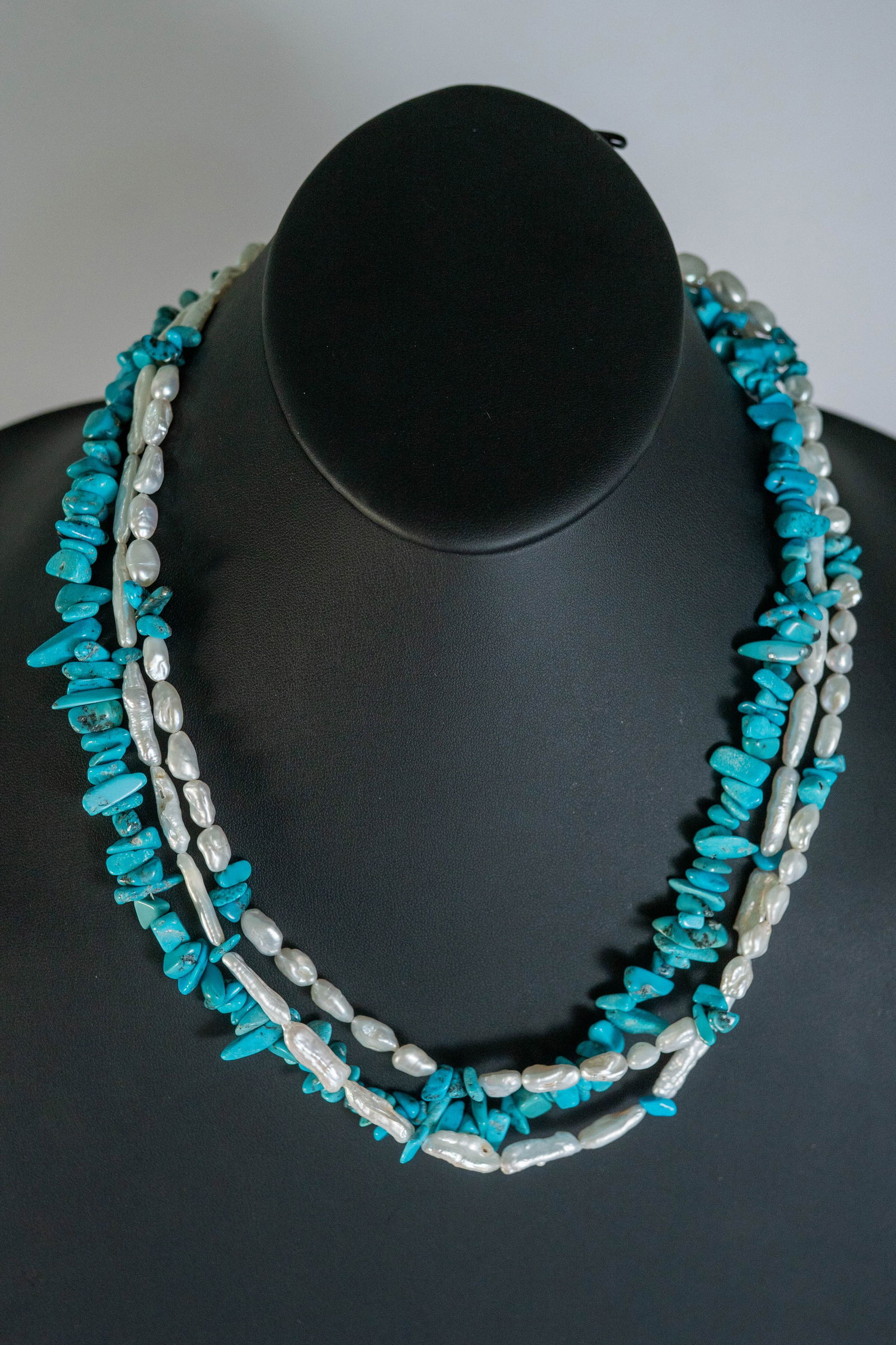 Stunning Sleeping Beauty & Pearl Necklace: Stunning three strand Sleeping Beauty Turquoise polished nugget and Freshwater Pearl necklace 22 1/2 " long with sterling silver findings.