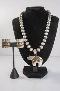 Tommy Singer Pendant Necklace & Earrings: Native American Navajo acclaimed artist and master silversmith Tommy Singer vintage sterling silver and 14k gold overlay hand tooled and hand stamped bear pendant L 2" x 2" W with matching sterling si