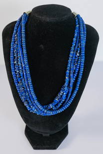 Marvelous Five Strand Lapis Necklace: Native American Navajo marvelous five strand necklace featuring AAAAA Afghanistan lapis Rondell heishi and Chip gemstones with gold matrix. Finished with sterling silver in caps and hand tool chain li
