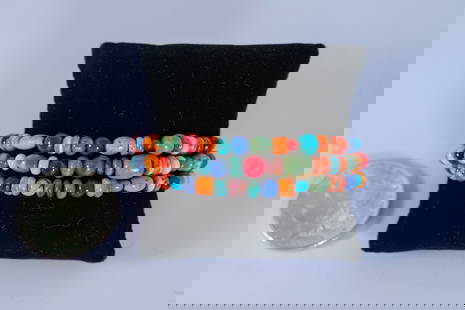 Multi-Gemstone Three Strand Bracelet: Native American Navajo three strand bracelet featuring Afghanistan Lapis, Carnelian, Turquoise, and Orange and Purple Spiny Oyster Shell gemstones with decorative sterling silver end caps and sterling