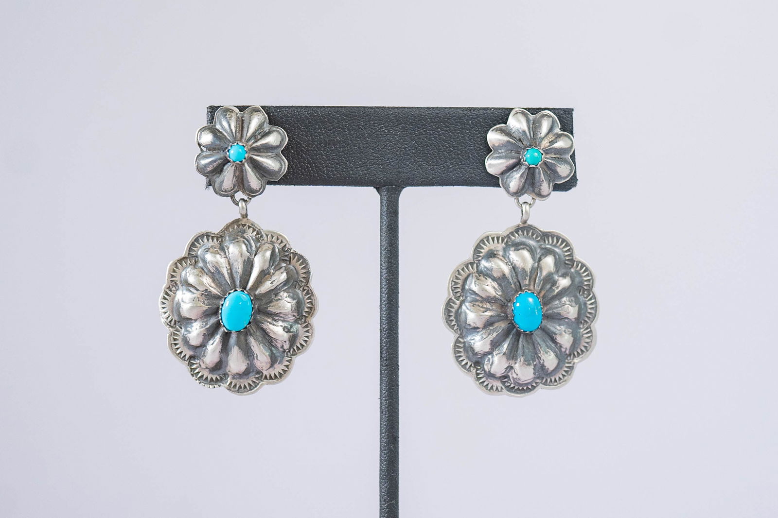Wonderfully Detailed Post Dangle Earrings: Native American Navajo wonderfully detailed sterling silver post-dangle earrings featuring AAAAA Kingman turquoise gemstones with handstand scalloped edges length 2" Signed JLC
