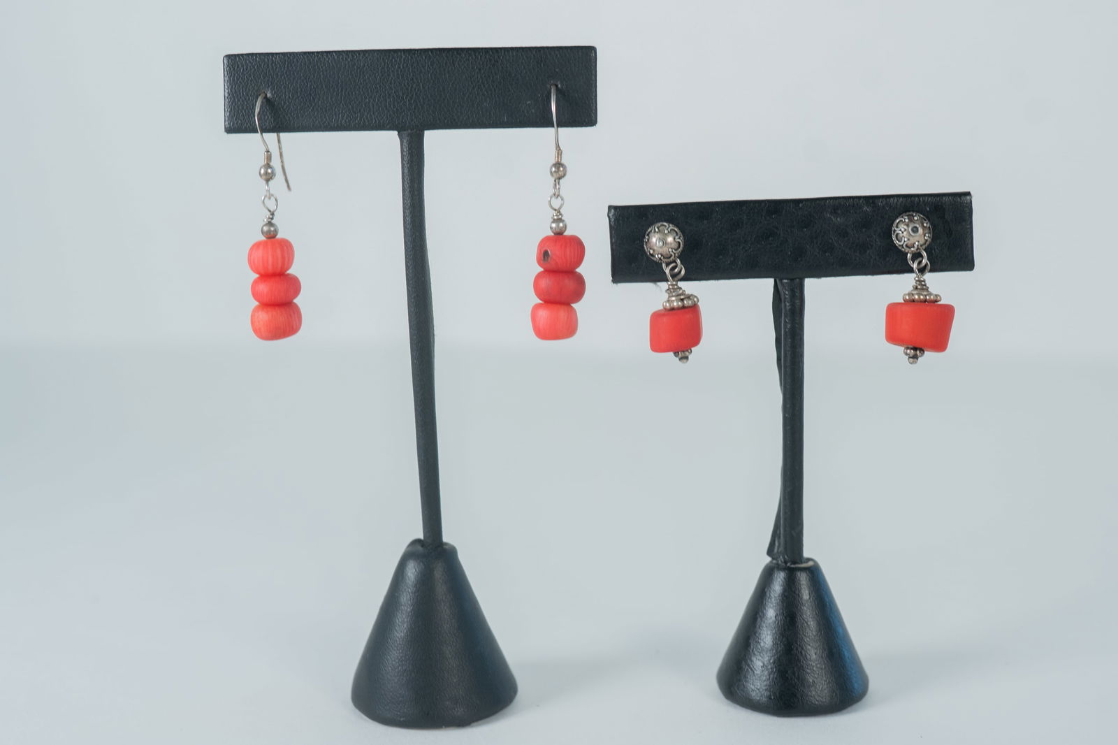 Vintage Oxidized Mediterranean Coral Earrings: Two pairs of Native American Navajo vintage oxidized Mediterranean Coral sterling silver earrings; One pair of post earrings and one pair wire earrings. Post Length 1" x 1/2 " Width Wire Length 1