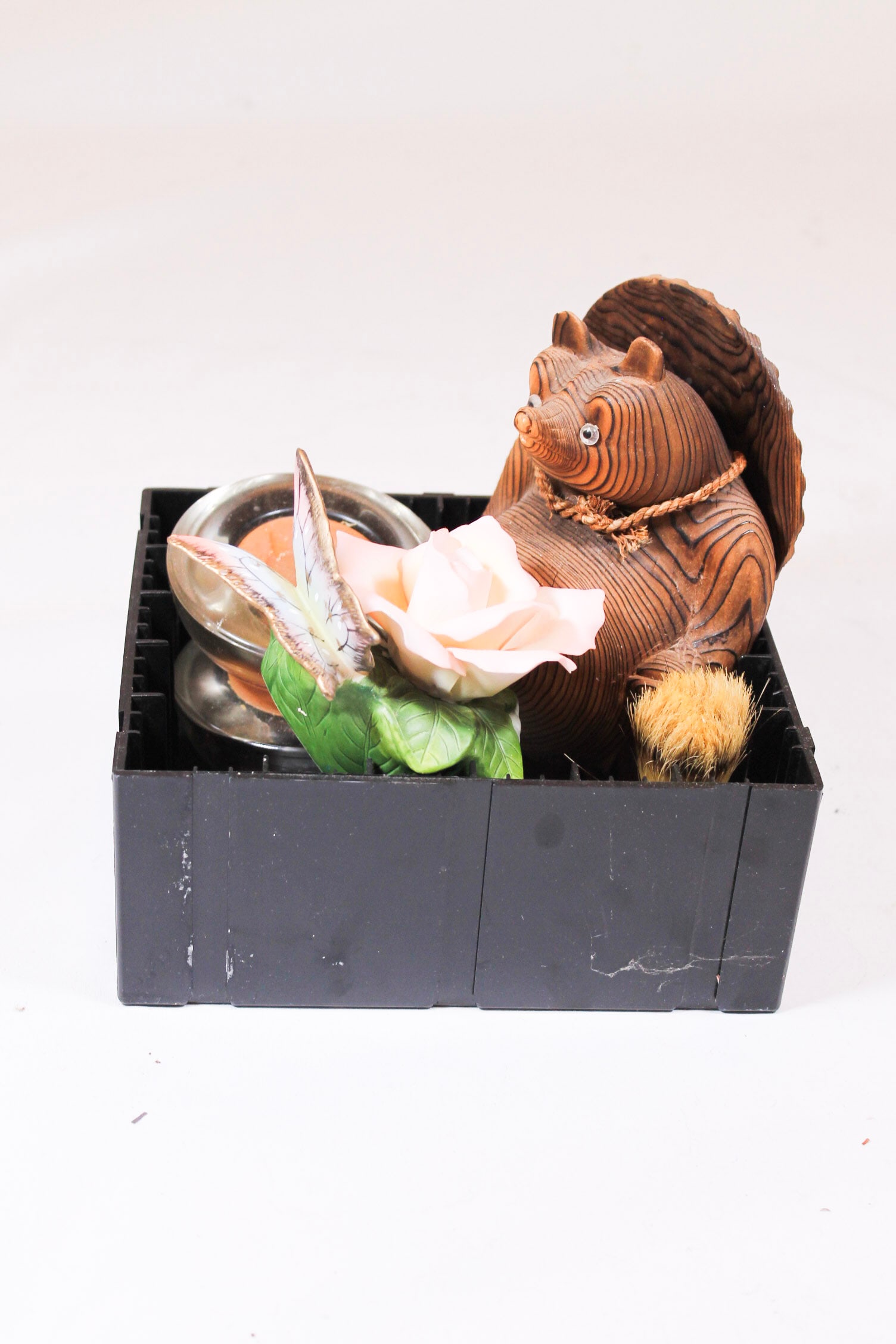 Box of ceramic decorative flower, clay bear and glass candles: Box of ceramic decorative flower, clay bear and glass candles