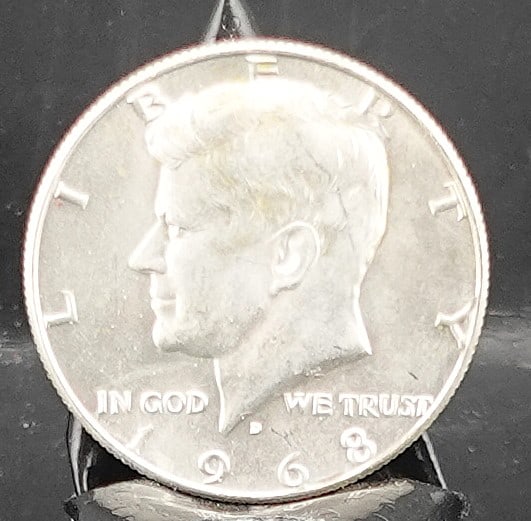 1886 Morgan Dollar: High Grade and 90% Silver Year: 1886 Coin Condition: Mint Condition Mint Marks: Denver Mint (D) Low Estimate: 40.00 High Estimate: 60.00