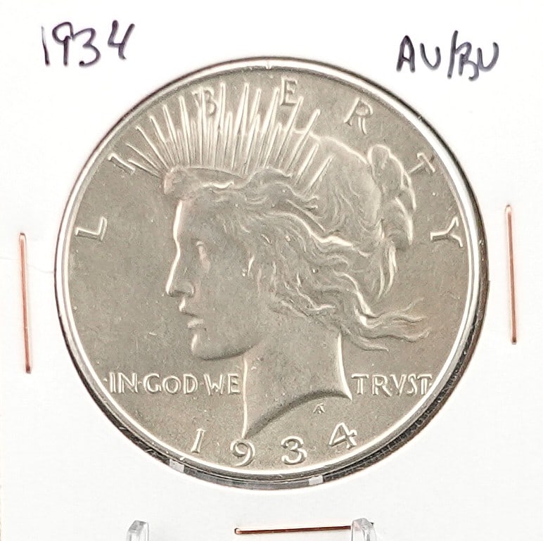 1934 Peace Dollar: Beautiful Coin! Key Date! Low Estimate: 150.00High Estimate: 200.00