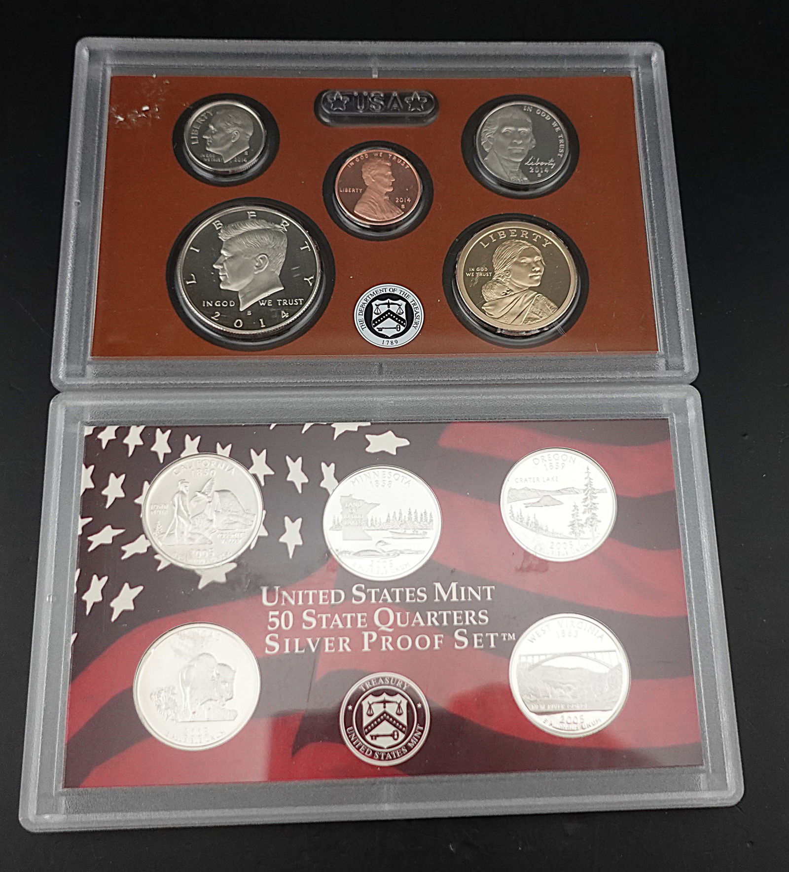 A Set of 2014-S and 2005-S Mint Sets: These are struck in 90% Silver! High Estimate: 120Low Estimate: 100