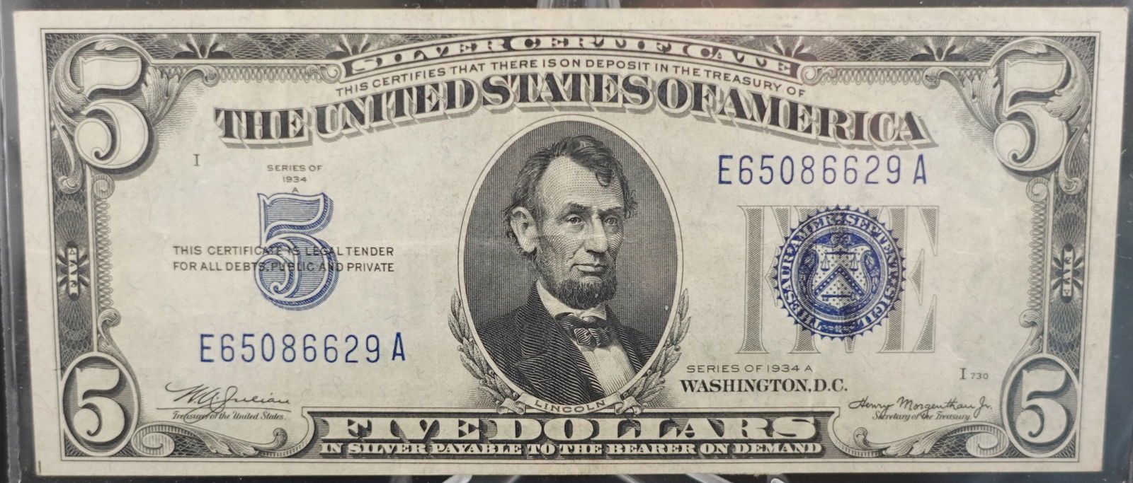 1934-A Blue Seal $5 Silver Certificate: This is a High Grade Note! Low Estimate: 100.00High Estimate: 150.00