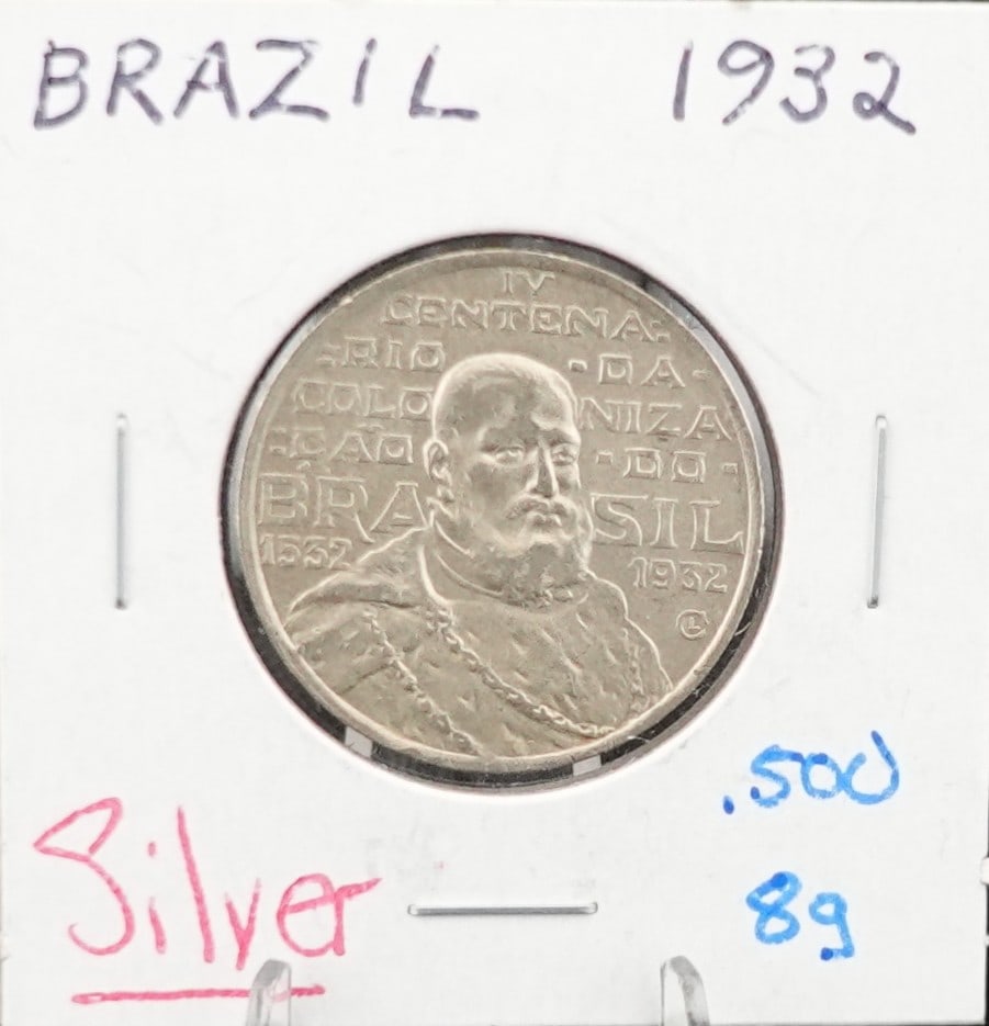 1932 Brazil 2000 Reis Coin: The weight is 8g and the Silver is .500 Finess High Estimate: 30Low Estimate: 20