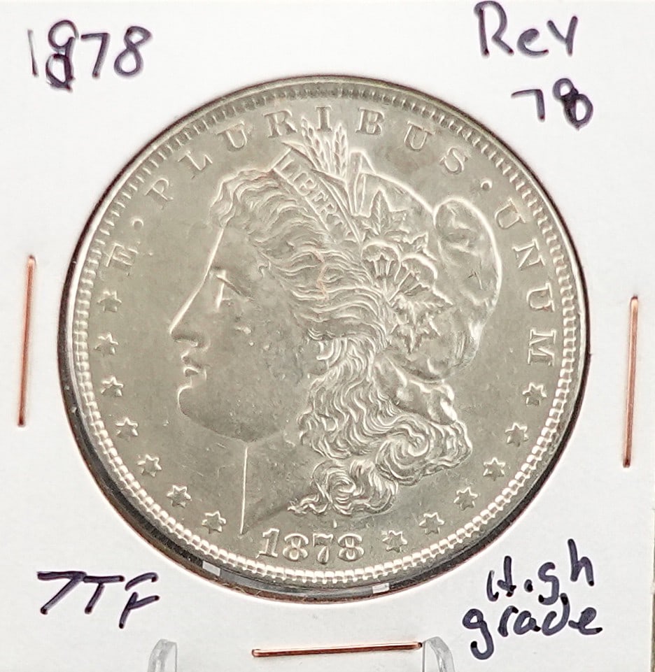1878 Rev 78 7TF Morgan Dollar: This coin has Full Breast Feathers and Great Luster! High Estimate: 300Low Estimate: 200