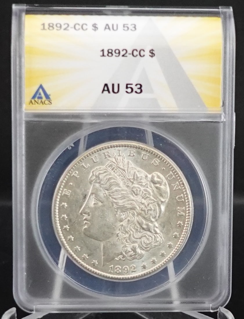 1892-CC Morgan Dollar: ANACS Graded AU53! This is an excellent coin! Hard to find at this grade! Low Estimate: 1100High Estimate: 1500