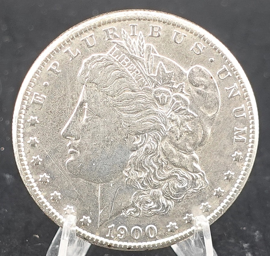 1900-S Morgan Dollar: This is a Key Date. Low Estimate: 150.00High Estimate: 200.00