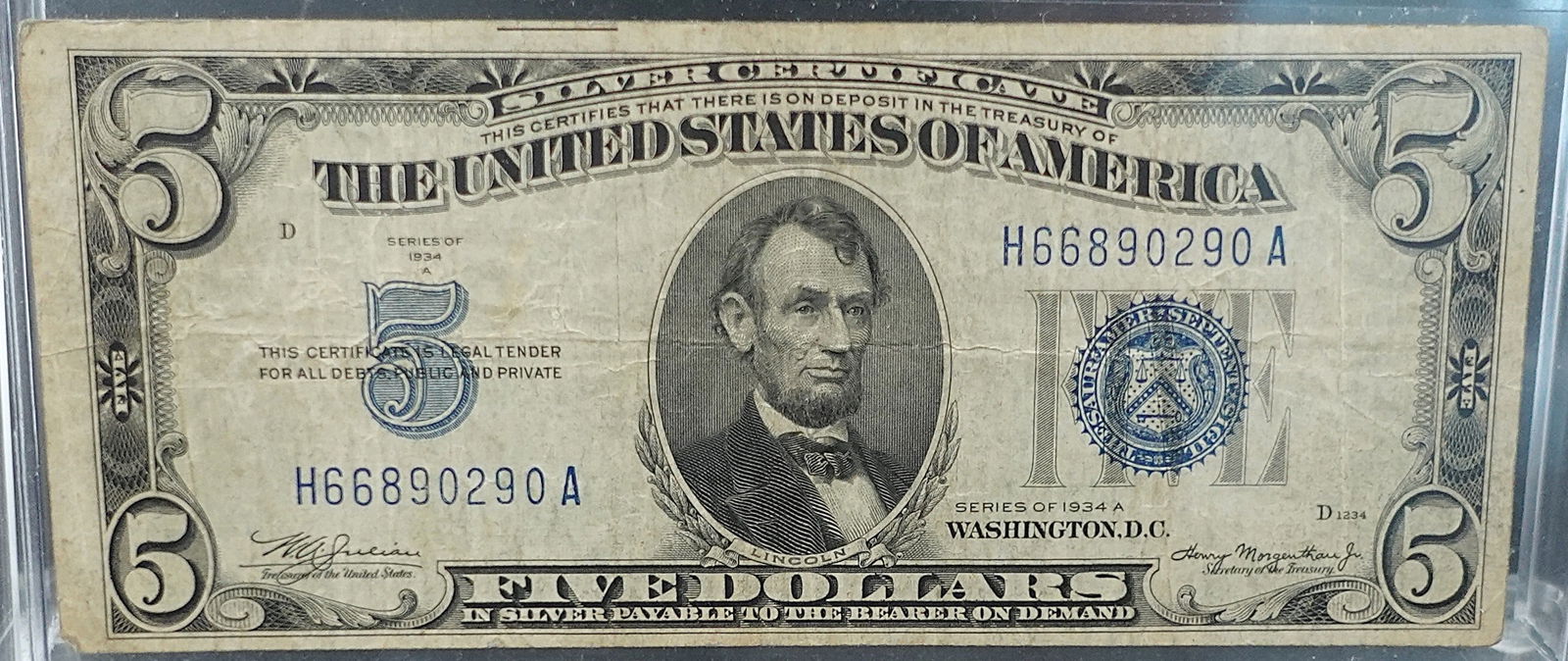 1934 A $5 Silver Certificate: This has good details! This isa Blue Seal Note! SN 0290 Low Estimate: 20.00 High Estimate: 30.00