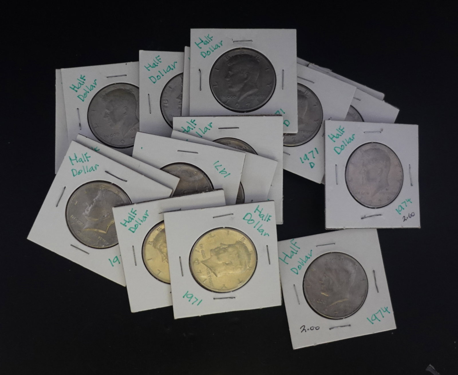 (18) Kennedy Half Dollars: Mixed dates and Mint Marks Low Estimate: 40.00 High Estimate: 60.00