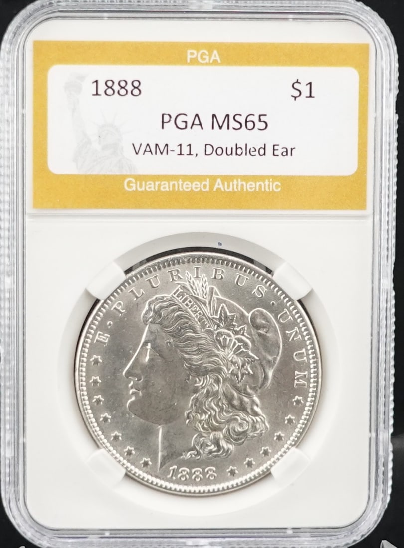 1888 Morgan Dollar: PGA MS-65 with a VAM 11 Variety Double Ear Low Estimate: 300 High Estimate: 350