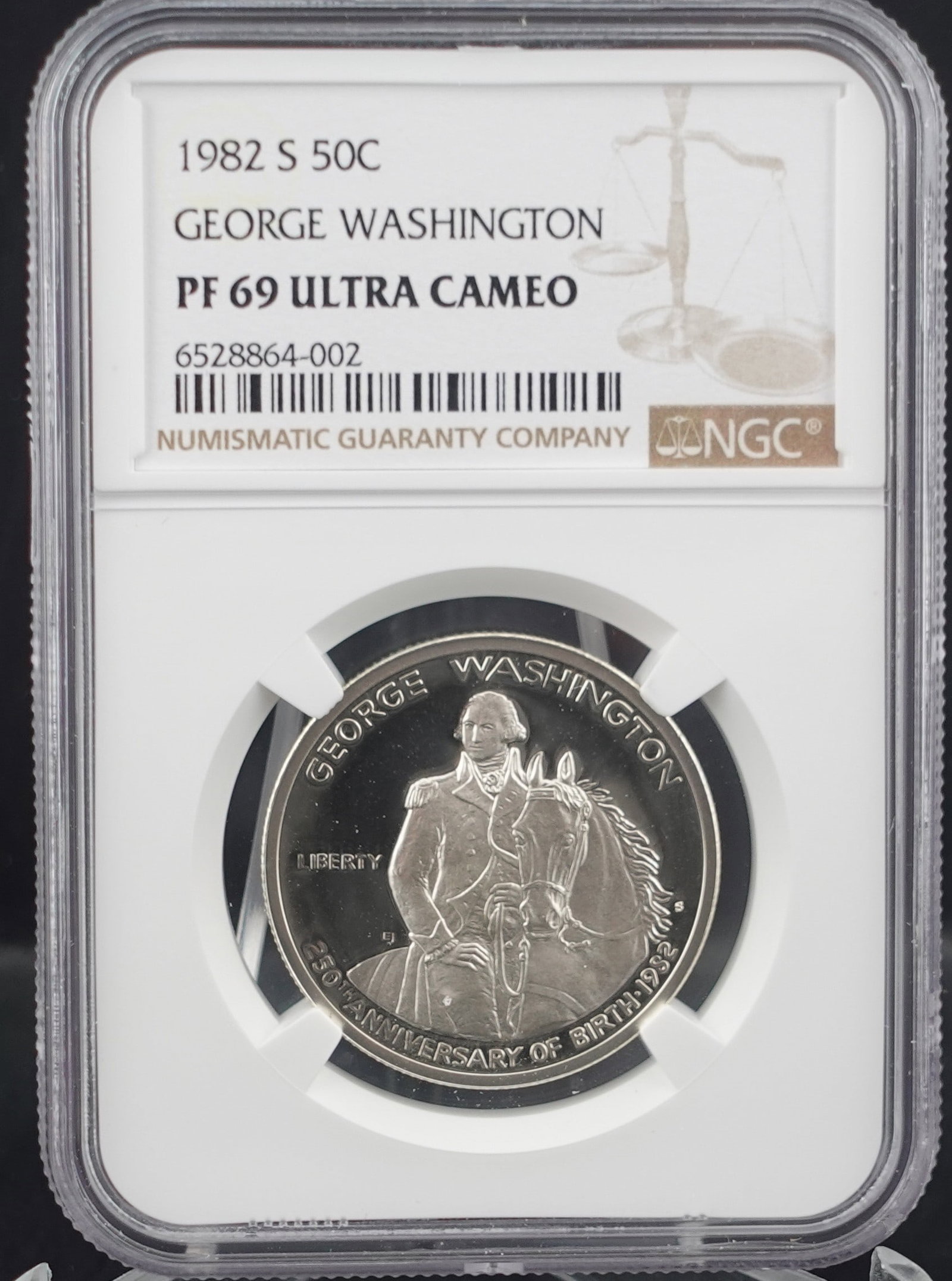 1982-S and 1982-D Washington Half Dollars: NGC Graded PF 68 Ultra Cameo and ANACS Graded MS 68 Low Estimate: 40 High Estimate: 60