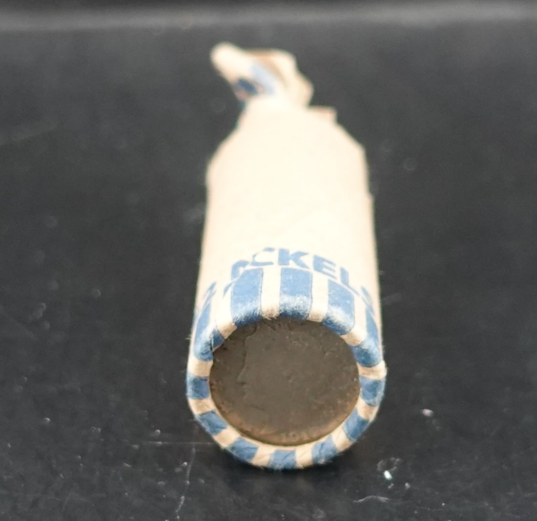 More than Half of a Roll of V Nickels: More than Half of a Roll of V Nickels High Estimate: 50 Low Estimate: 30