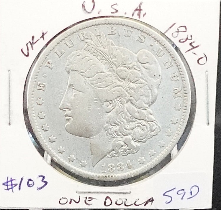 1884-O Morgan Dollar: Nicer Date High Estimate: 90 Low Estimate: 70