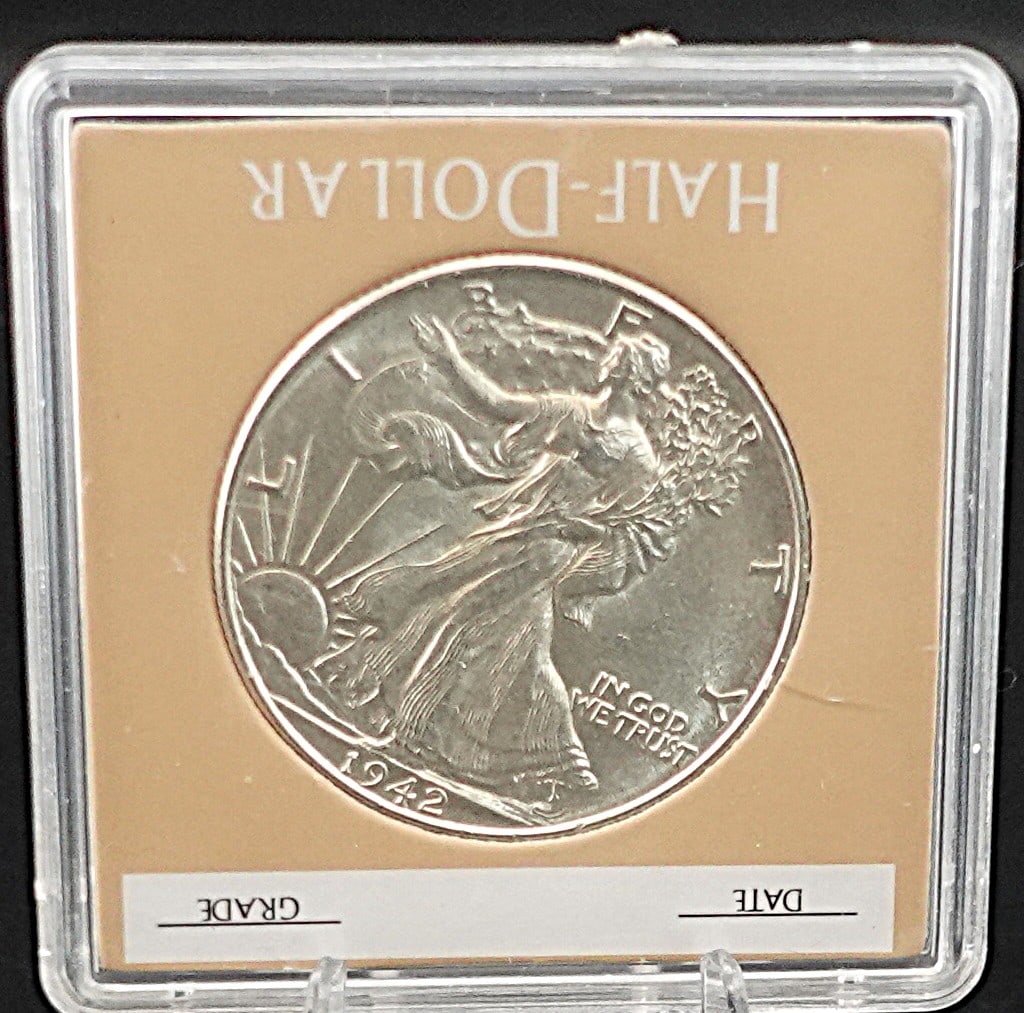 1942 Walking Liberty Half Dollar: This has full Feather! Excellent Luster! High Graded MS66/67! Low Estimate: 150 High Estimate: 200